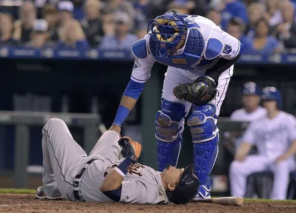 April 19, 2016 - Kansas City, MO, USA - Kansas City Royals catcher Salvador Perez checks on the Detroit Tigers Victor Martinez after he was hit by a pitch from Kelvin Herrera in the eighth inning on Tuesday, April 19, 2016, at Kauffman Stadium in Kansas City, Mo. The Royals won, 8-6. Detroit at Kansas City - ZUMAm67_