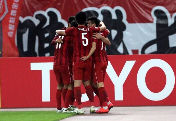 Players of China s Shanghai SIPG celebrate after scoring a goal against Australia s Melbourne Victory in their Group G match during the 2016 AFC Champions League in Shanghai, China, 19 April 2016. China s Shanghai SIPG defeated Australia s Melbourne Victory 3-1. Shanghai SIPG beats Melbourne Victory at AFC Champions League  20160419_65747