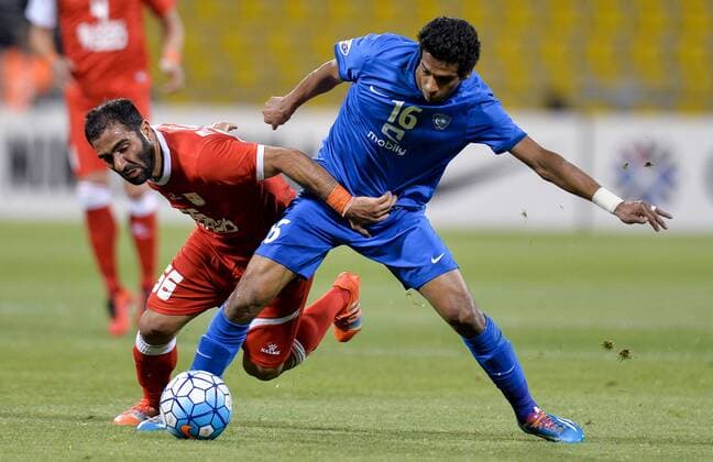 (160420) -- DOHA, April 20, 2016 -- Yousef Alsalem (R) of Al Hilal vies with Mehdi Kiani of Tractor Sazi Tabriz during the AFC Asian Champions League Group C football match between Iran s Tractor Sazi Tabriz and Saudi Arabia s Al Hilal in Doha, Qatar, April 19, 2016. Tractor Sazi Tabriz won 2-0. (Xinhua ) (SP)QATAR-DOHA-SOCCER-AFC ASIAN CHAMPIONS LEAGUE Nikku 