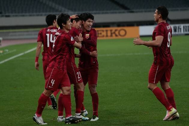 Players of China s Shanghai SIPG celebrate after scoring a goal against Australia s Melbourne Victory in their Group G match during the 2016 AFC Champions League in Shanghai, China, 19 April 2016. China s Shanghai SIPG defeated Australia s Melbourne Victory 3-1. Shanghai SIPG beats Melbourne Victory at AFC Champions League  20160420_28533
