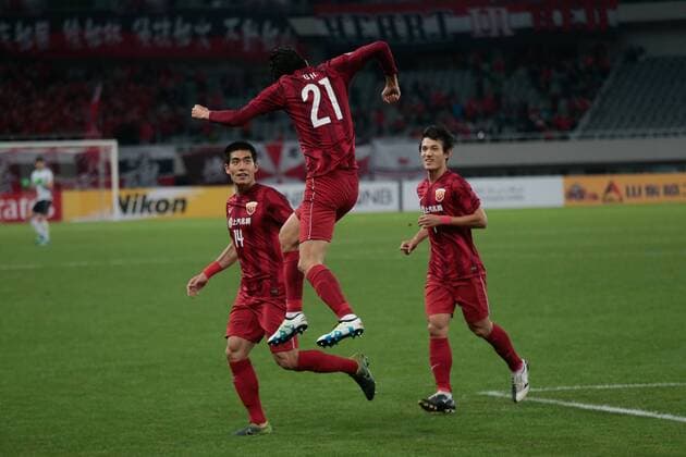 Players of China s Shanghai SIPG celebrate after scoring a goal against Australia s Melbourne Victory in their Group G match during the 2016 AFC Champions League in Shanghai, China, 19 April 2016. China s Shanghai SIPG defeated Australia s Melbourne Victory 3-1. Shanghai SIPG beats Melbourne Victory at AFC Champions League  20160420_60020