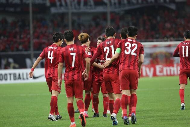 Players of China s Shanghai SIPG celebrate after scoring a goal against Australia s Melbourne Victory in their Group G match during the 2016 AFC Champions League in Shanghai, China, 19 April 2016. China s Shanghai SIPG defeated Australia s Melbourne Victory 3-1. Shanghai SIPG beats Melbourne Victory at AFC Champions League  20160419_35672