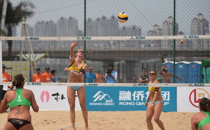 (160420) -- FUZHOU, April 20, 2016 -- Switzerland s Dunja Gerson(2nd R) Nicole Eiholzer (2nd L) compete with Germany s Julia Grorner(1st L) Victoria Bieneck during the match at 2016 FIVB Beach volleyball Beachvolleyball Fuzhou Open in Fuzhou, capital of southeast China s Fujian Province, April 20, 2016. The Swiss pair won by 2-1. ) (SP)CHINA-FUZHOU-BEACH VOLLEYBALL-FUZHOU OPEN 2016 LinxShanchuan 