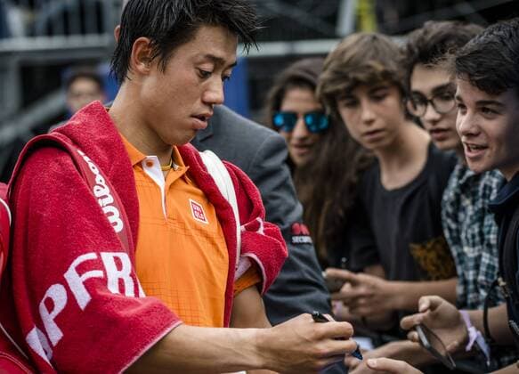 April 22, 2016 - Barcelona, Catalonia, Spain - KEI NISHIKORI (JAP) signs autographs after winning against Alexandr Dolgopolov (UKR) their quarter-final of the Barcelona Open Banc Sabadell 2016. Nishikori wins 7-5, 6-0 Nishikori Reaches Barcelona Open 2016 Semi Finals - ZUMAo105