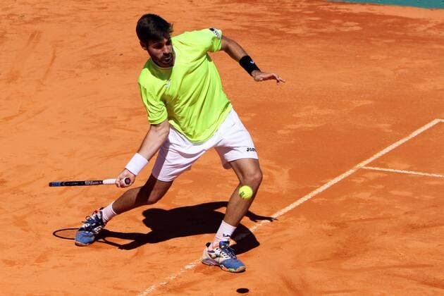 April 23, 2016 - Estoril, Portugal - Gerard Granollers of Spain returns a ball to Andrea Arnaboldi of Italy during the Qualifying of the Millennium Estoril Open ATP Tennis Herren 250 tennis tournament at the Clube de TÃƒÂ©nis do Estoril in Portugal on April 25, 2016. Millennium Estoril Open ATP 250 tennis tournament - Andrea Arnaboldi (ITA) vs Gerard Granollers (ESP) - ZUMAf123