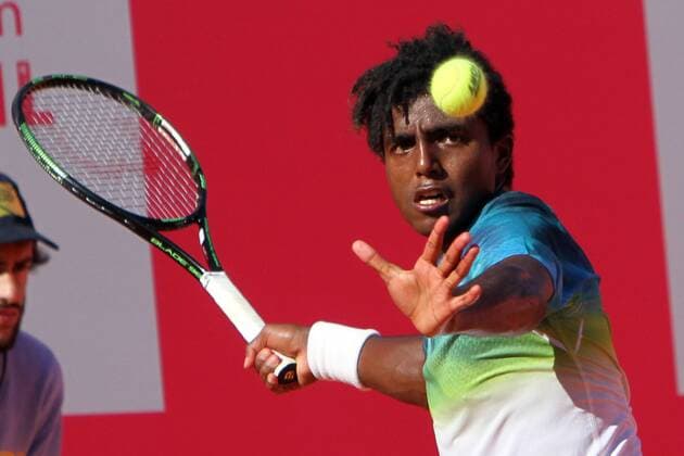 April 23, 2016 - Estoril, Portugal - Swedish Elias Ymer returns a ball to Portuguese Rui Machado during the Qualifying of the Millennium Estoril Open ATP Tennis Herren 250 tennis tournament at the Clube de TÃƒÂ©nis do Estoril in Portugal on April 25, 2016. Millennium Estoril Open  - ZUMAn230