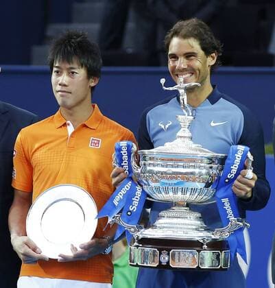 Nadal reclaims Barcelona Open title Spaniard Rafael Nadal (R) and Kei Nishikori of Japan hold the winner s and runner-up s trophies during the victory ceremony of the Barcelona Open in the Spanish city on April 24, 2016. Nadal defeated the two-time defending champion 6-4, 7-5 to reclaim the title. 