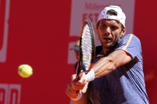 April 26, 2016 - Estoril, Portugal - Paul-Henri Mathieu of France returns a ball to Gastao Elias of Portugal during the Millennium Estoril Open ATP Tennis Herren 250 tennis tournament at the Clube de TÃƒÂ©nis do Estoril in Portugal on April 26, 2016. Paul-Henri Mathieu won 2-0 Millennium Estoril Open ATP 250 tennis tournament - Gastao Elias (POR) vs Paul-Henri Mathieu (FRA) - ZUMAf123