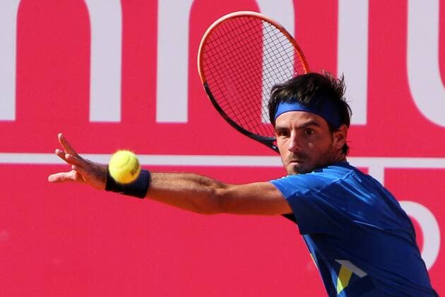 April 26, 2016 - Estoril, Portugal - Gastao Elias of Portugal returns a ball to Paul-Henri Mathieu of France during the Millennium Estoril Open ATP Tennis Herren 250 tennis tournament at the Clube de TÃƒÂ©nis do Estoril in Portugal on April 26, 2016. Paul-Henri Mathieu won 2-0 Millennium Estoril Open ATP 250 tennis tournament - Gastao Elias (POR) vs Paul-Henri Mathieu (FRA) - ZUMAf123
