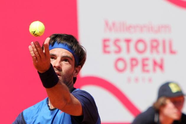 April 26, 2016 - Estoril, Portugal - Gastao Elias of Portugal serves a ball to Paul-Henri Mathieu of France during the Millennium Estoril Open ATP Tennis Herren 250 tennis tournament at the Clube de TÅ½nis do Estoril in Portugal on April 26, 2016. Paul-Henri Mathieu won 2-0 Millennium Estoril Open ATP 250 tennis tournament - Gastao Elias (POR) vs Paul-Henri Mathieu (FRA) - ZUMAf123