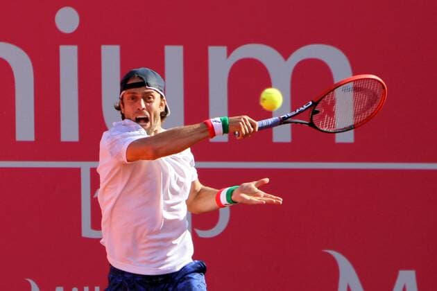 April 26, 2016 - Estoril, Portugal - Paolo Lorenzi of Italy returns a ball to Elias Ymer of Sweden during the Millennium Estoril Open ATP Tennis Herren 250 tennis tournament at the Clube de TÅ½nis do Estoril in Portugal on April 26, 2016. Millennium Estoril Open ATP 250 tennis tournament - Paolo Lorenzi (ITA) vs Elias Ymer (SWE) - ZUMAf123