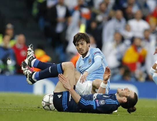Gareth Bale of Real Madrid tackled by David Silva of Manchester City, minutes later Silva went off injured during the UEFA Champions League Semi Final match at Etihad Stadium. Photo credit should read: Simon Bellis Sportimage EDITORIAL USE ONLY. No use with unauthorised audio, video, data, fixture lists, club league logos or live services. Online in-match use limited to 120 images, no video emulation. No use in betting, games or single club league player publications.