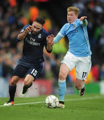 Football - 2015 2016 Champions League - Semi-Final, First Leg: Manchester City vs. Real Madrid Dani Carvajal of Real Madrid and Kevin de Bruyne of Man City at the Etihad Stadium. COLORSPORT ANDREW COWIE 