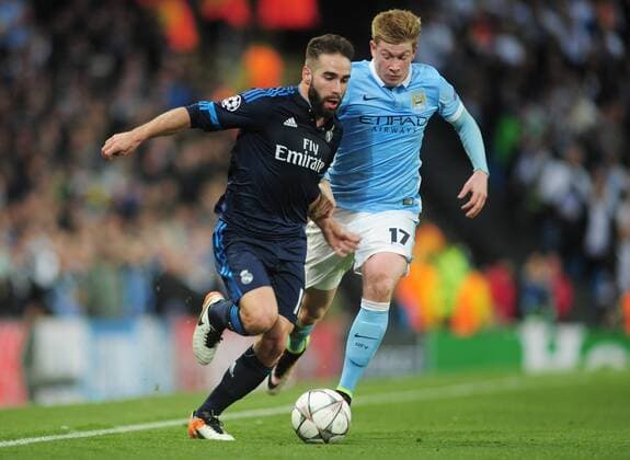 Football - 2015 2016 Champions League - Semi-Final, First Leg: Manchester City vs. Real Madrid Dani Carvajal of Real Madrid and Kevin de Bruyne of Man City at the Etihad Stadium. COLORSPORT ANDREW COWIE 