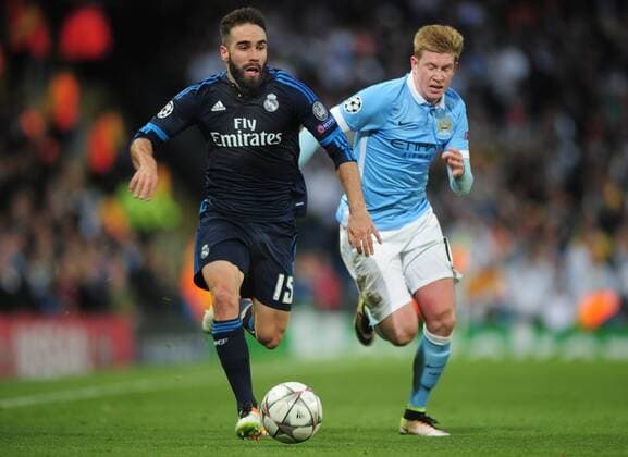 Football - 2015 2016 Champions League - Semi-Final, First Leg: Manchester City vs. Real Madrid Dani Carvajal of Real Madrid and Kevin de Bruyne of Man City at the Etihad Stadium. COLORSPORT ANDREW COWIE 