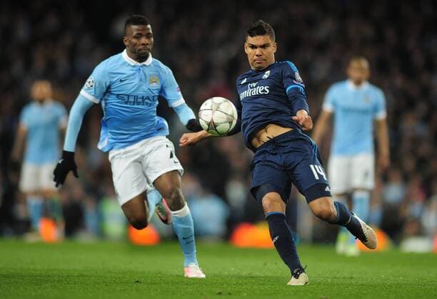 Football - 2015 2016 Champions League - Semi-Final, First Leg: Manchester City vs. Real Madrid Casemiro of Real Madrid and Kelechi Iheanacho of Man City at the Etihad Stadium. COLORSPORT ANDREW COWIE 