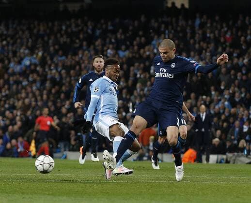 Pepe of Real Madrid nicks the ball off the feet of Raheem Sterling of Manchester City as he is clear on goal during the UEFA Champions League Semi Final match at Etihad Stadium. Photo credit should read: Simon Bellis Sportimage EDITORIAL USE ONLY. No use with unauthorised audio, video, data, fixture lists, club league logos or live services. Online in-match use limited to 120 images, no video emulation. No use in betting, games or single club league player publications.