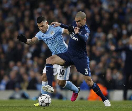 Sergio Aguero of Manchester City tussles with Pepe of Real Madrid during the UEFA Champions League Semi Final match at Etihad Stadium. Photo credit should read: Simon Bellis Sportimage EDITORIAL USE ONLY. No use with unauthorised audio, video, data, fixture lists, club league logos or live services. Online in-match use limited to 120 images, no video emulation. No use in betting, games or single club league player publications.