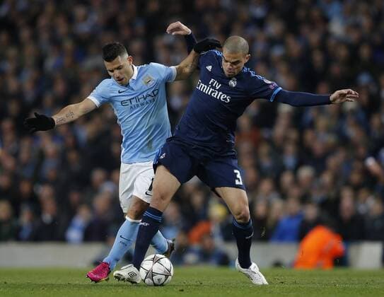 Sergio Aguero of Manchester City tussles Pepe of Real Madrid during the UEFA Champions League Semi Final match at Etihad Stadium. Photo credit should read: Simon Bellis Sportimage via PA Images EDITORIAL USE ONLY. No use with unauthorised audio, video, data, fixture lists, club league logos or live services. Online in-match use limited to 120 images, no video emulation. No use in betting, games or single club league player publications.