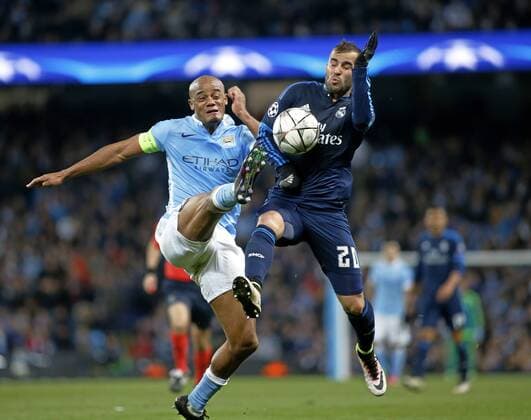 First leg of 1 2 Champions League between Manchester City and Real Madrid. In this picture, Kompany and Jese. xJosexA.xGarciax 