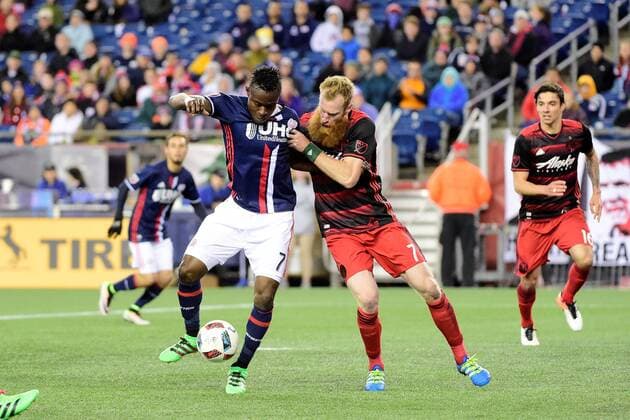Wednesday, April 27, 2016: Portland Timbers defender Nat Borchers (7) (left) and New England Revolution midfielder Gershon Koffie (7) (right) battle for the ball during the MLS Fussball Herren USA game between Portland Timbers and the New England Revolution held at Gillette Stadium in Foxborough Massachusetts. Portland tied New England 1-1. MLS 2016: Timbers vs Revolution APR 27 - ZUMAc04_