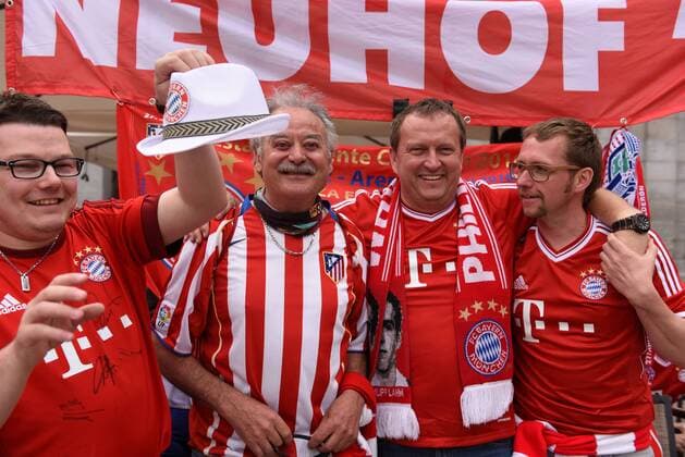 Spain: Bayern Munich fans in Madrid Nearly 3,000 Bayern fans travel to Madrid to watch the UEFA Champions League match between Atlético de Madrid (Spain) and Bayern Munich (Germany) . Supporters congregate in the streets around Plaza Mayor in central Madrid prior the game.  JorgexSanz