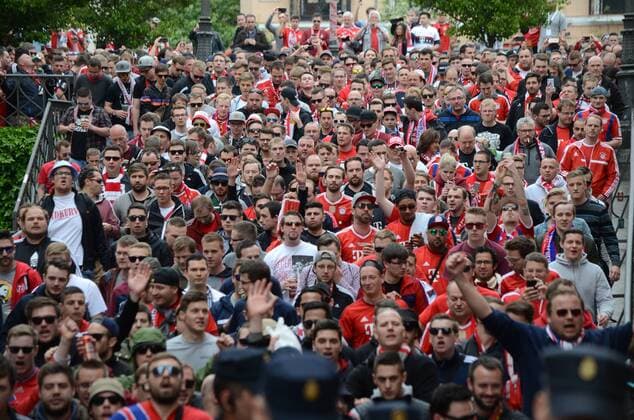 Spain: Bayern Munich fans in Madrid Nearly 3,000 Bayern fans travel to Madrid to watch the UEFA Champions League match between Atlético de Madrid (Spain) and Bayern Munich (Germany) . Supporters congregate in the streets around Plaza Mayor in central Madrid prior the game.  JorgexSanz