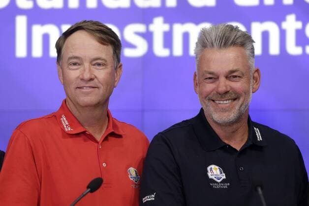 Ryder Cup Captains Davis Love III and Darren Clarke ring the opening bell at the Nasdaq in Times Square in New York City on April 28, 2016.  NYP20160428110 JOHNxANGELILLO