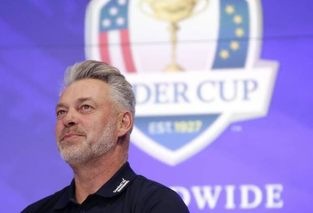 Ryder Cup Captain Darren Clarke of England rings the opening bell at the Nasdaq in Times Square in New York City on April 28, 2016.  NYP20160428113 JOHNxANGELILLO