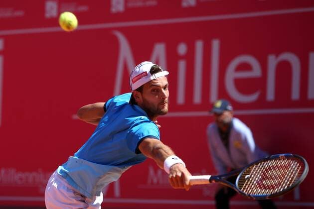 April 28, 2016 - Estoril, Portugal - Portuguese Joao Sousa returns a ball to Spanish Nicolas Almagro during the Millennium Estoril Open ATP Tennis Herren 250 tennis tournament at the Clube de Tenis do Estoril in Portugal on April 27, 2016. Millennium Estoril Open ATP 250 tennis tournament - Jo‹o Sousa (POR) vs Spanish Nicolas Almagro (ESP) - ZUMAf123