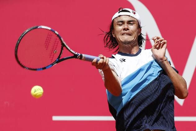 Portugal : Pablo Carreno Busta wins for 6-4, 7-5 against Taro Daniel during the Estoril Open Tournament Taro Daniel of Japan in action against Pablo Carreno Busta of Spain during their second round match for the Estoril Open tennis tournament where Busta won at 6-4, 7-5  FilipexAmorim