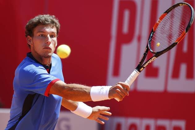 Portugal : Pablo Carreno Busta wins for 6-4, 7-5 against Taro Daniel during the Estoril Open Tournament Pablo Carreno Busta of Spain in action against Taro Daniel of Japan during their second round match for the Estoril Open tennis tournament where he won at 6-4, 7-5  FilipexAmorim
