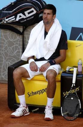 Swiss tennis player Novak Djokovic reacts during a training session for the Mutua Madrid Open at Caja Magica court in Madrid, Spain, 30 April 2016. The Mutua Madrid Open runs from 29 April to 08 May 2016. Stanislas Wawrinka training !ACHTUNG: NUR REDAKTIONELLE NUTZUNG!  20160430-635976315518158410