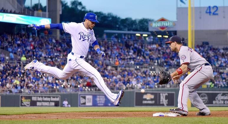 May 2, 2016 - Kansas City, MO, USA - Kansas City Royals Paulo Orlando reaches first ahead of the throw to Washington Nationals first baseman Ryan Zimmerman, but was called out for running in the grass and not in the base path during the third inning on Monday, May 2, 2016, at Kauffman Stadium in Kansas City, Mo. Washington Nationals at Kansas City Royals - ZUMAm67_