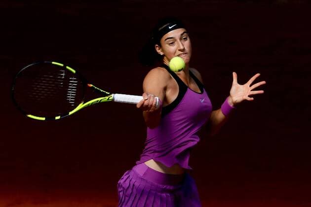 French tennis player Caroline Garcia returns the ball to Slovak Dominika Cibulkova during their Mutua Madrid Open tennis tournament second round match at the Caja Magica Tennis Center in Madrid, Spain, 03 May 2016. The Mutua Madrid Open runs from 29 April until 08 May 2016. CAROLINE GARCIA VS DOMINIKA CIBULKOVA !ACHTUNG: NUR REDAKTIONELLE NUTZUNG!  GRA256 20160503-635978918730876625
