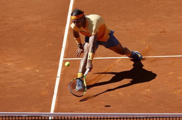 Spanish tennis player Rafael Nadal returns the ball to Russian Andrey Kuznetsov during their Mutua Madrid Open tennis tournament second round match at the Caja Magica Tennis Center in Madrid, Spain, 03 May 2016. The Mutua Madrid Open runs from 29 April until 08 May 2016. RAFAEL NADAL VS ANDREY KUZNETSOV !ACHTUNG: NUR REDAKTIONELLE NUTZUNG!  GRA256 20160503-635978932305426458