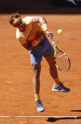 Spanish tennis player Rafael Nadal returns the ball to Russian Andrey Kuznetsov during their Mutua Madrud Open match held at Caja Magica court in Madrid, Spain, 3 May 2016. RAFAEL NADAL VS ANDREY KUZNETSOV !ACHTUNG: NUR REDAKTIONELLE NUTZUNG!  MAD002 20160503-635979017182211559