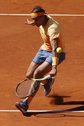 Spanish tennis player Rafael Nadal returns the ball to Russian Andrey Kuznetsov during their Mutua Madrud Open match held at Caja Magica court in Madrid, Spain, 3 May 2016. RAFAEL NADAL VS ANDREY KUZNETSOV !ACHTUNG: NUR REDAKTIONELLE NUTZUNG!  MAD005 20160503-635979019682781559