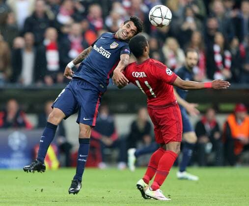 SOCCER - CL, Bayern vs Atletico MUNICH,GERMANY,03.MAY.16 - SOCCER - UEFA Champions League, semifinal, FC Bayern Muenchen vs Atletico Madrid. Image shows Augusto Fernandez (Atletico) and Douglas Costa (Bayern). GEPAxpictures xThomasxBachun