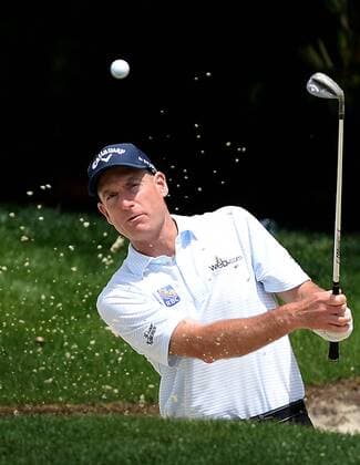 May 3, 2016 - Charlotte, NC, USA - Jim Furyk watches his ball s flight from a sand trap during practice rounds on Tuesday, May 3, 2016, at Quail Hollow Club in Charlotte, N.C., ahead of first-round action in the Wells Fargo Championship on Thursday. Practice rounds ahead of Wells Fargo Championship - ZUMAm67_