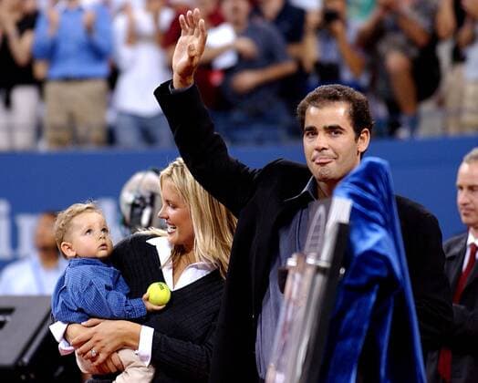 BRIDGETTE WILSON AND SON.K32407AR.PETE SAMPRAS HONORED WITH TRIBUTE AT COURTSIDE AFTER HIS ANNOUNCEMENT OF RETIREMENT FROM TENNIS. .AT THE 2003 US OPEN TENNIS TOURNAMENT IN FLUSHING, QUEENS. NEW YORK New York.8 25 2003. 2003 PETE SAMPRAS US OPEN AR - ZUMAg115