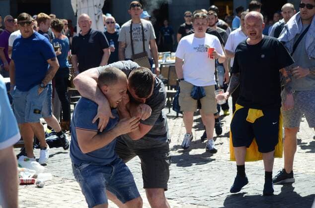 Manchester City fans fight among themselves Two Manchester City fans pictured hitting each other in Madrid. Nearly 10,000 Manchester City fans travel to Madrid to watch the semi-final UEFA Champions League match between Real Madrid (Spain) and Manchester City F.C (England). Supporters congregate in the streets around Plaza Mayor in central Madrid prior the game.  JORGExSANZxGARCIA
