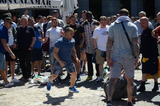 Manchester City fans fight among themselves Two Manchester City fans pictured hitting each other in Madrid. Nearly 10,000 Manchester City fans travel to Madrid to watch the semi-final UEFA Champions League match between Real Madrid (Spain) and Manchester City F.C (England). Supporters congregate in the streets around Plaza Mayor in central Madrid prior the game.  JORGExSANZxGARCIA