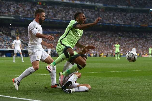 Fußball, CL, Real Madrid - Manchester City Lucas Vazquez of Real Madrid tackles Raheem Sterling of Manchester City during the UEFA Champions League Semi Final 2nd leg match at the Santiago Bernabeu stadium. Photo credit should read: Philip Oldham Sportimage EDITORIAL USE ONLY. No use with unauthorised audio, video, data, fixture lists, club league logos or live services. Online in-match use limited to 120 images, no video emulation. No use in betting, games or single club league player publications.