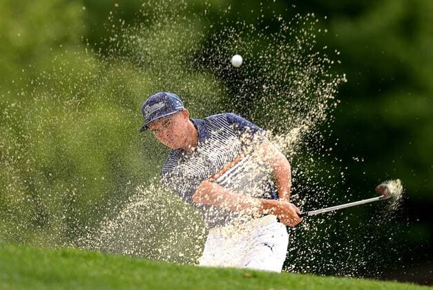 May 4, 2016 - Charlotte, NC, USA - Rickie Fowler hits from a sand trap near the 15th green during a Pro-Am at Quail Hollow Club in Charlotte, N.C., on Wednesday, May 4, 2016. Wells Fargo Pro-Am - ZUMAm67_