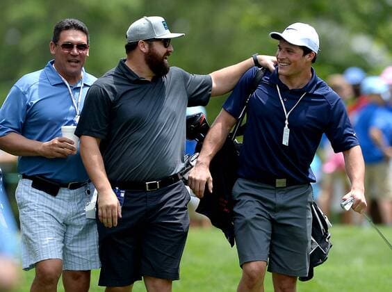 May 4, 2016 - Charlotte, NC, USA - Carolina Panthers head coach Ron Rivera, left, looks on as center Ryan Kalil, center, jokes with linebacker Luke Kuechly as they walk to the second green during a Pro-Am at Quail Hollow Club in Charlotte, N.C., on Wednesday, May 4, 2016. Wells Fargo Pro-Am - ZUMAm67_