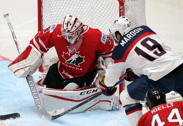 ST. PETERSBURG, RUSSIA. MAY 6, 2016. Canada s goalie Cam Talbot (L), Morgan Rielly (R) defend against the United States Auston Matthews (C) in their 2016 IIHF World Championship WM Weltmeisterschaft Preliminary Round Group B Ice hockey Eishockey match at the Yubileyny Sports Palace. Sergei Savostyanov TASS  TS021D1F