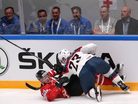 ST. PETERSBURG, RUSSIA. MAY 6, 2016. Canada s Corey Perry (L) and the United States Matt Hendricks fight for the puck in their 2016 IIHF World Championship WM Weltmeisterschaft Preliminary Round Group B Ice hockey Eishockey match at the Yubileyny Sports Palace. Sergei Savostyanov TASS  TS021D20
