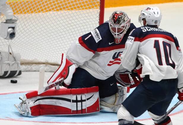 ST. PETERSBURG, RUSSIA. MAY 6, 2016. United States Jordan Schroeder (R) looks on as goalie Keith Kinkaid concedes a goal in the 2016 IIHF World Championship WM Weltmeisterschaft Preliminary Round Group B Ice hockey Eishockey match against Canada at the Yubileyny Sports Palace. Team Canada won the game 5-1. Sergei Savostyanov TASS  TS021D8D