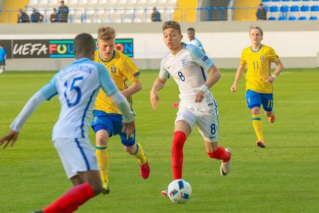 Azerbaijan: UEFA U17 U 17 - England - Sweden Andre Dozzell (8) of England fights for the ball with Sweden players during UEFA European Under-17 Championship Azerbaijan 2016, Group C match between England v Sweden at the Karabakh Stadium.  AzizxKarimov